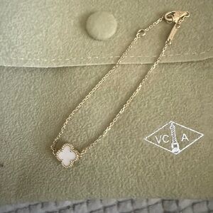 Van Cleef & Arpels Gold Bracelet with White Clover Charm